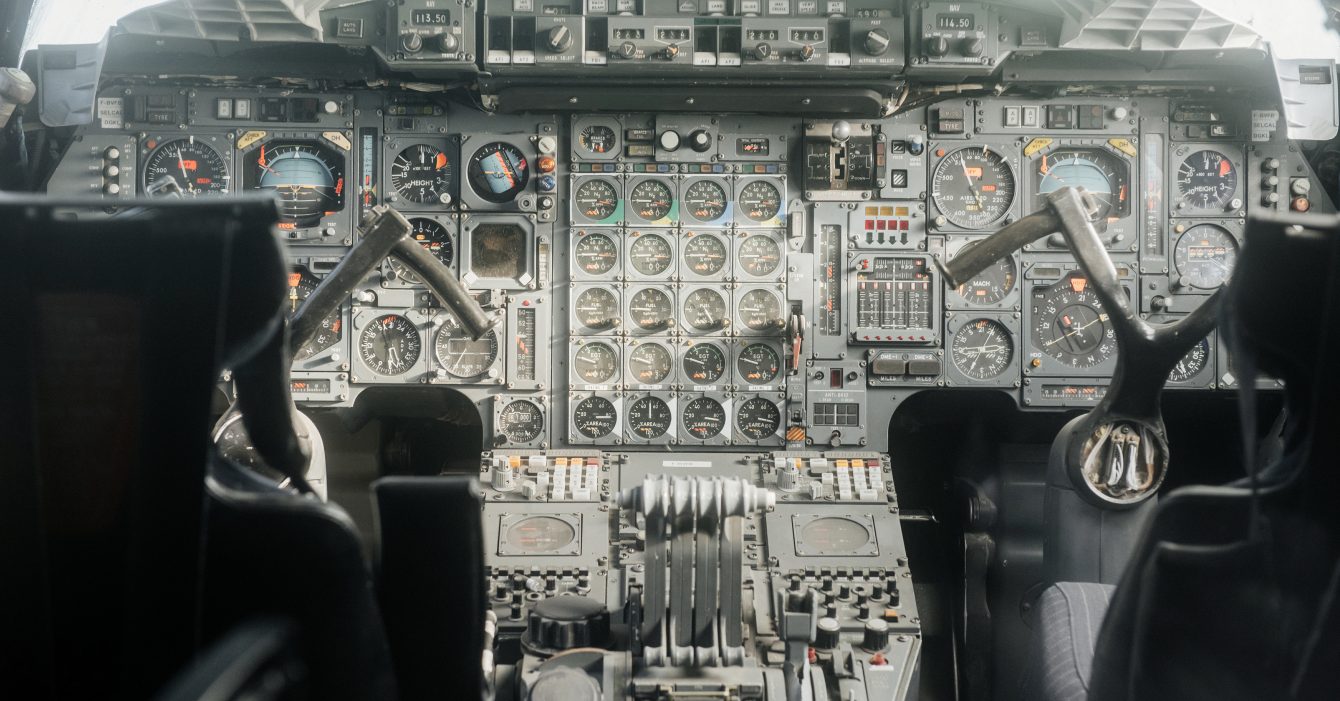 SINSHEIM, GERMANY - OCTOBER 16, 2018: Technik Museum. Professional instruments. Old analog cockpit of the plane. Inside near pilot seats
