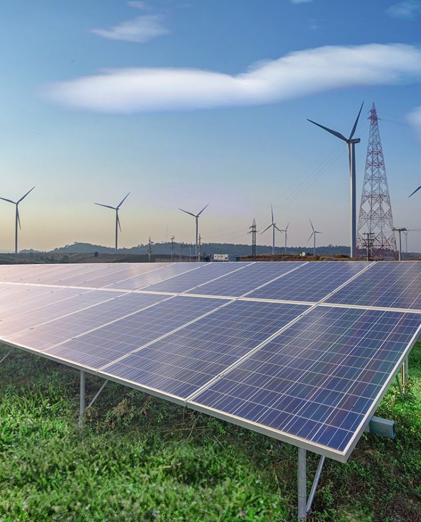 renewable-energy-solar-panels-wind-turbines-green-grass-blue-sky renewable-energy-solar-panels-wind-turbines-green-grass-blue-sky